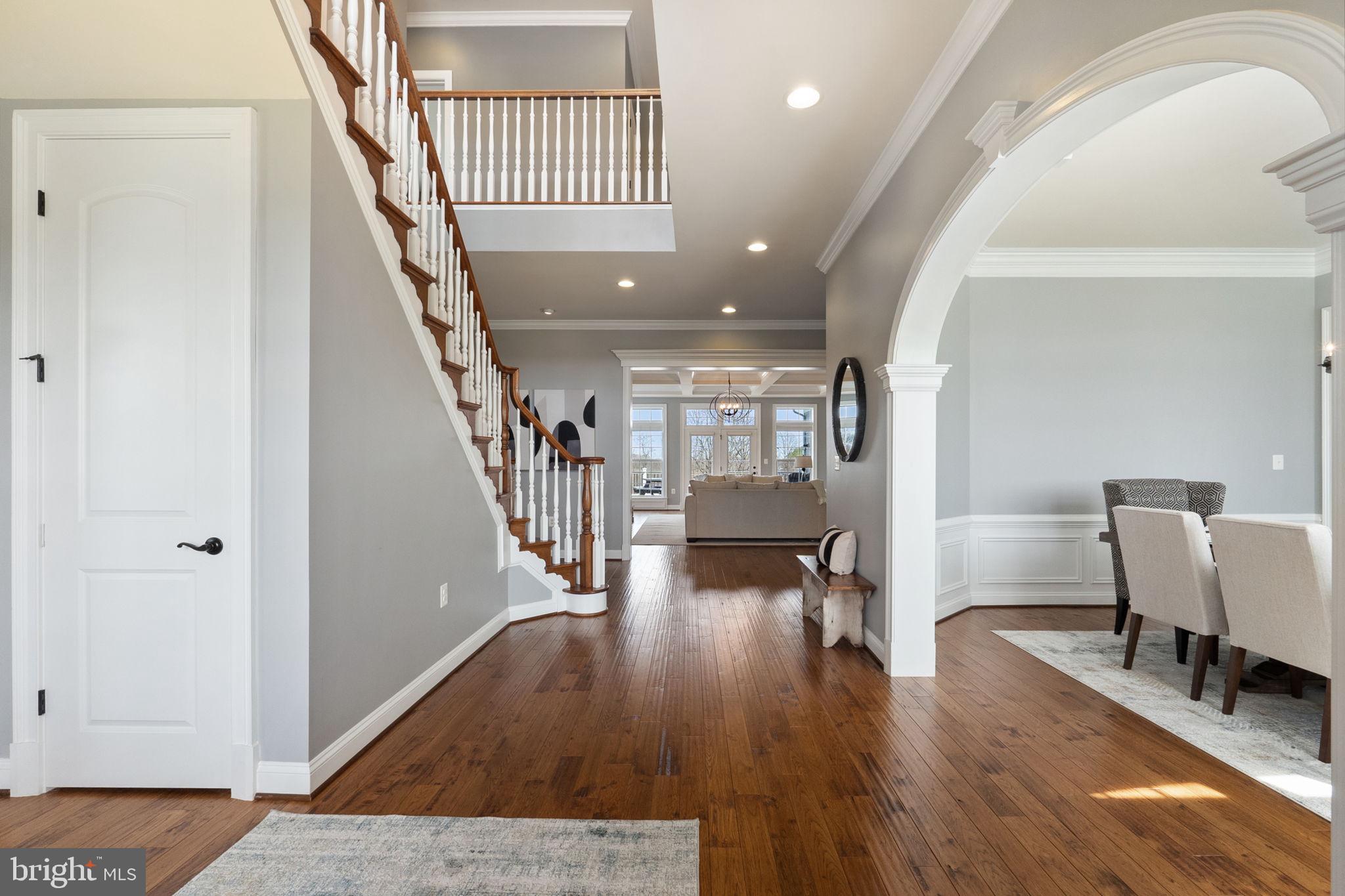 18482 Wild Raspberry Drive Purcellville, VA 20132 - Photo 21 of 143 a view of a livingroom with furniture and stairs