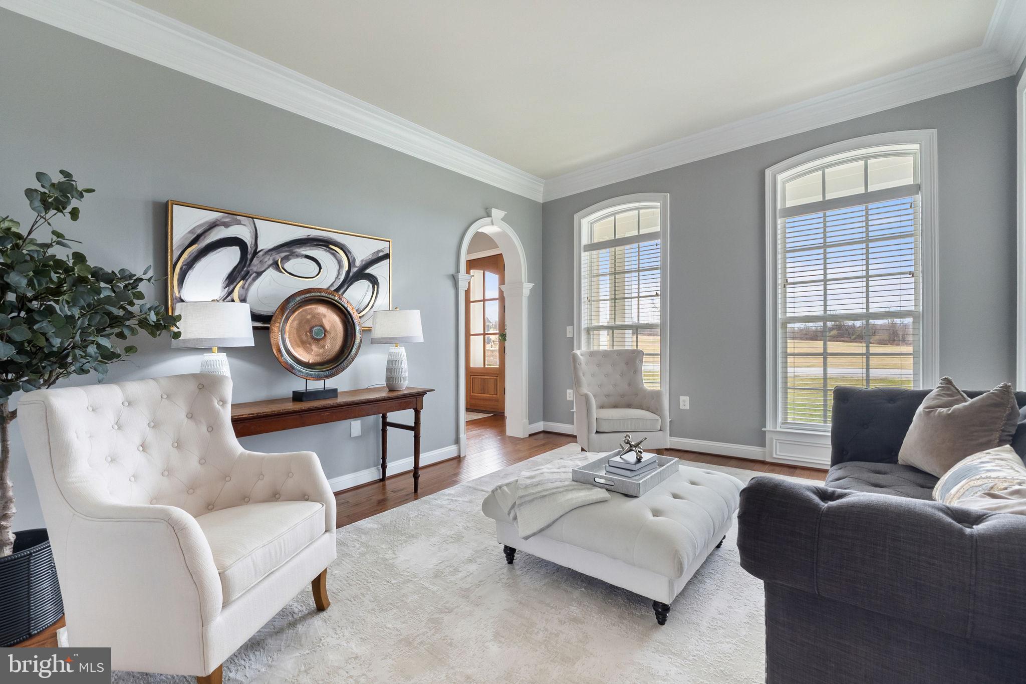 18482 Wild Raspberry Drive Purcellville, VA 20132 - Photo 25 of 143 a living room with furniture and wooden floor
