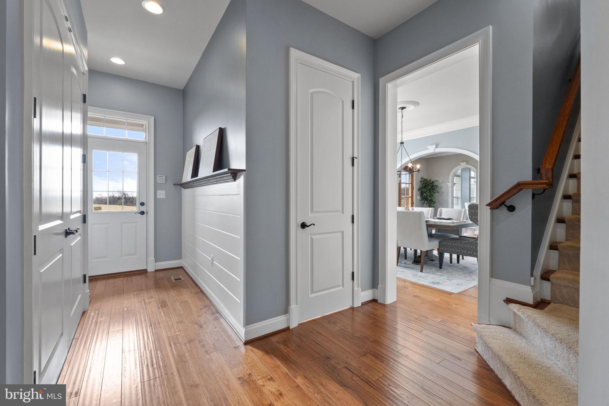18482 Wild Raspberry Drive Purcellville, VA 20132 - Photo 43 of 143 from kitchen toward garage and first porch entry