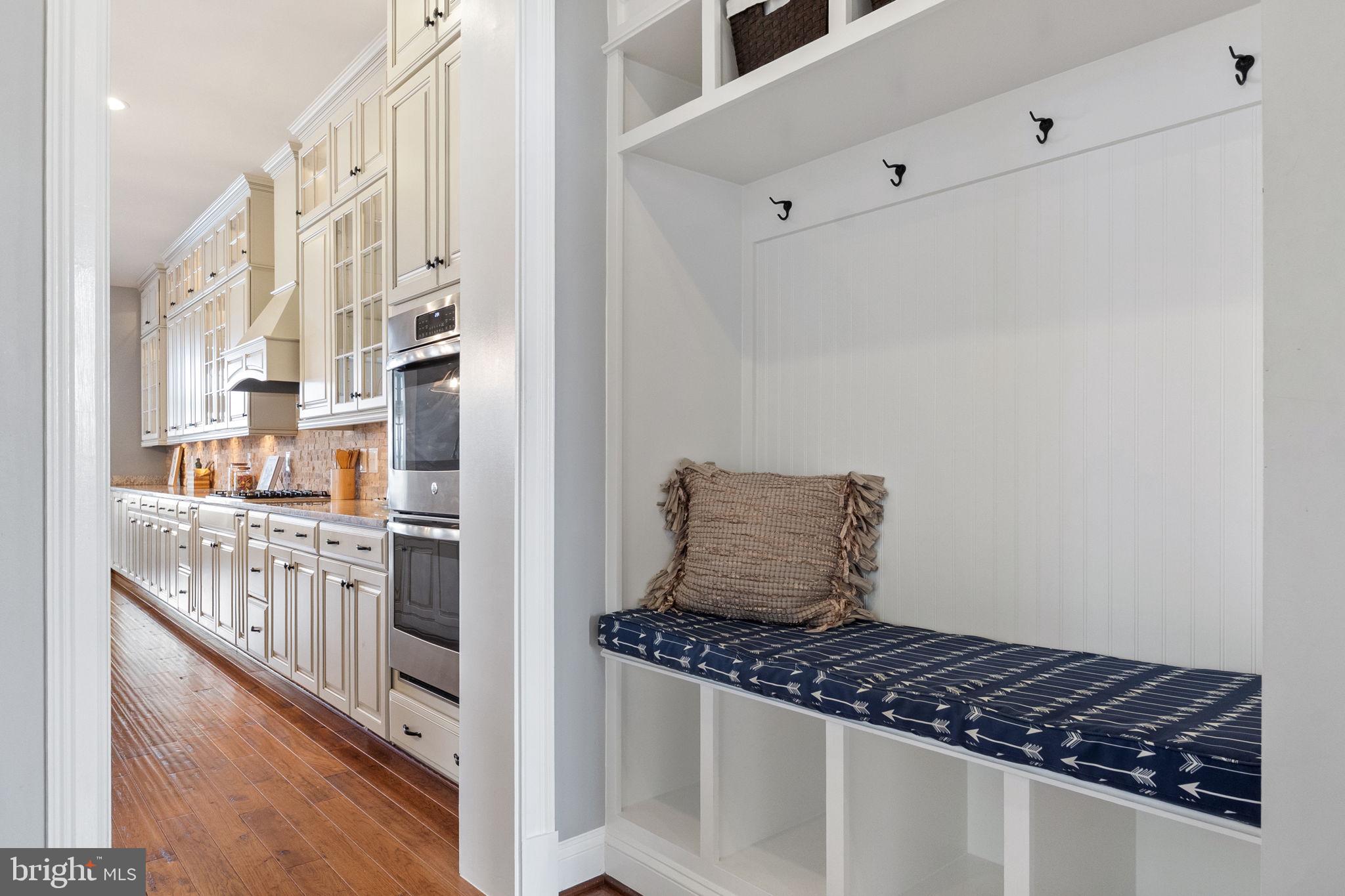 18482 Wild Raspberry Drive Purcellville, VA 20132 - Photo 44 of 143 entry hallway from garage and first porch