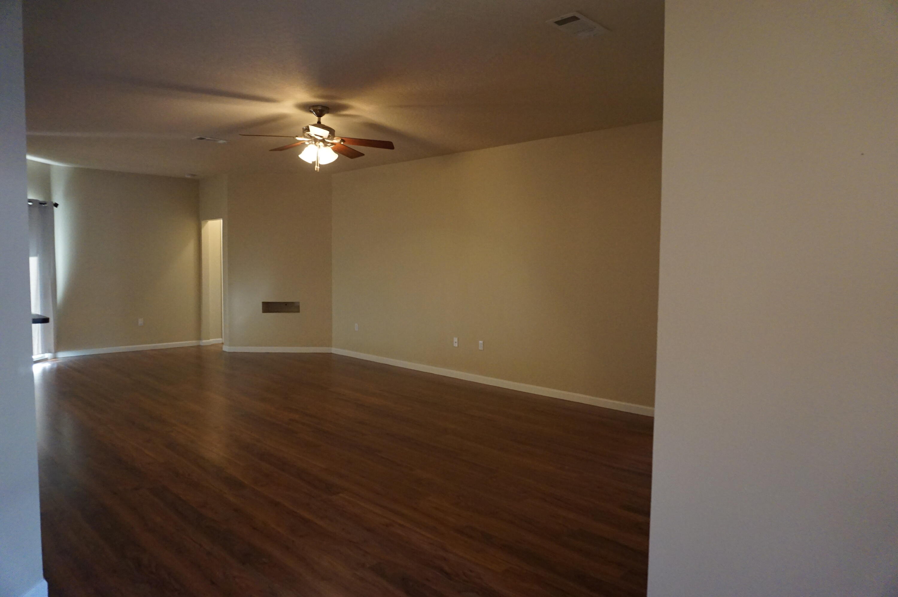 5263 Moore Loop Crestview, FL 32536 - Photo 17 of 37 a view of a livingroom with a fan