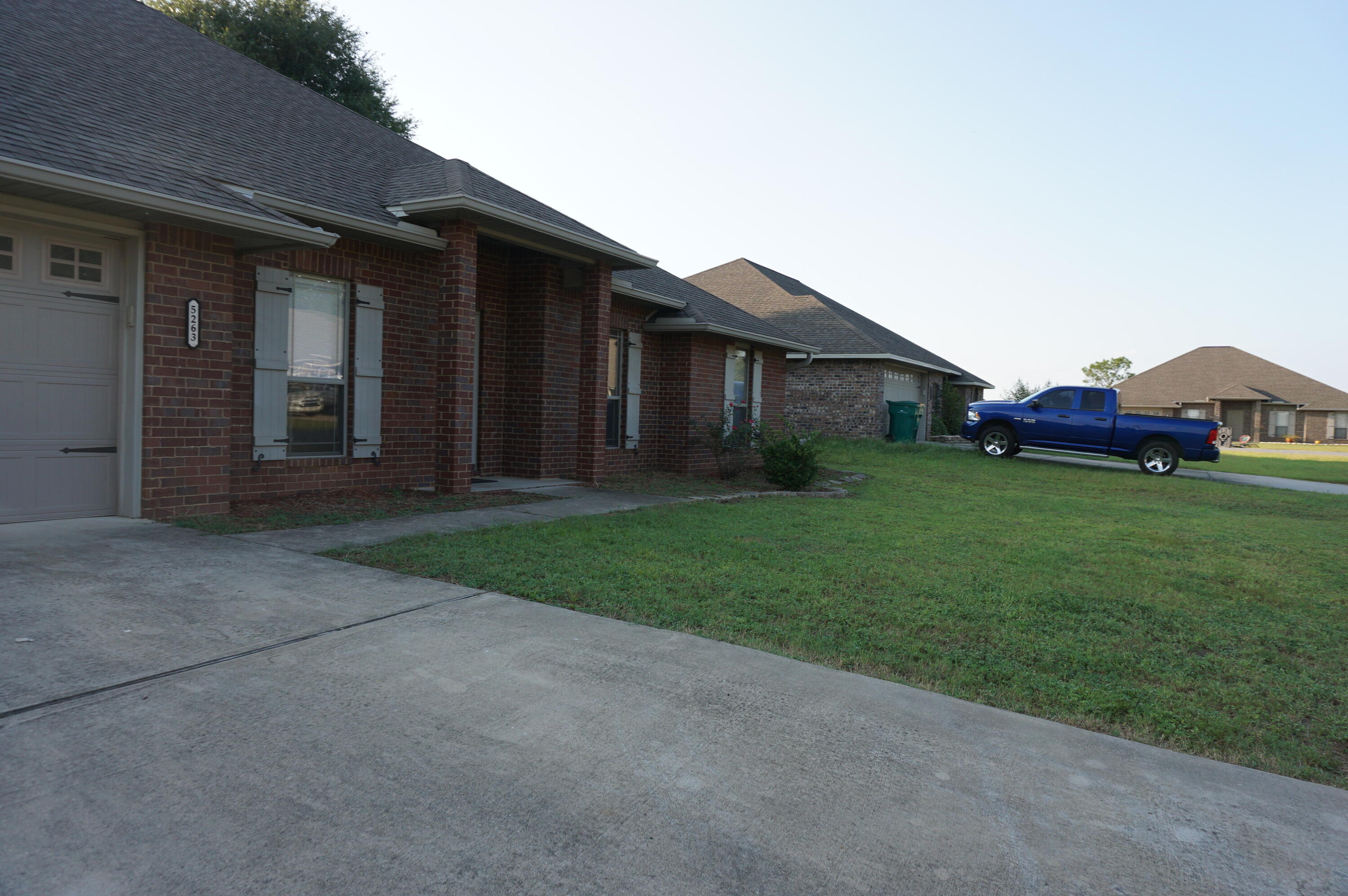 5263 Moore Loop Crestview, FL 32536 - Photo 2 of 37 front view of a house with a yard