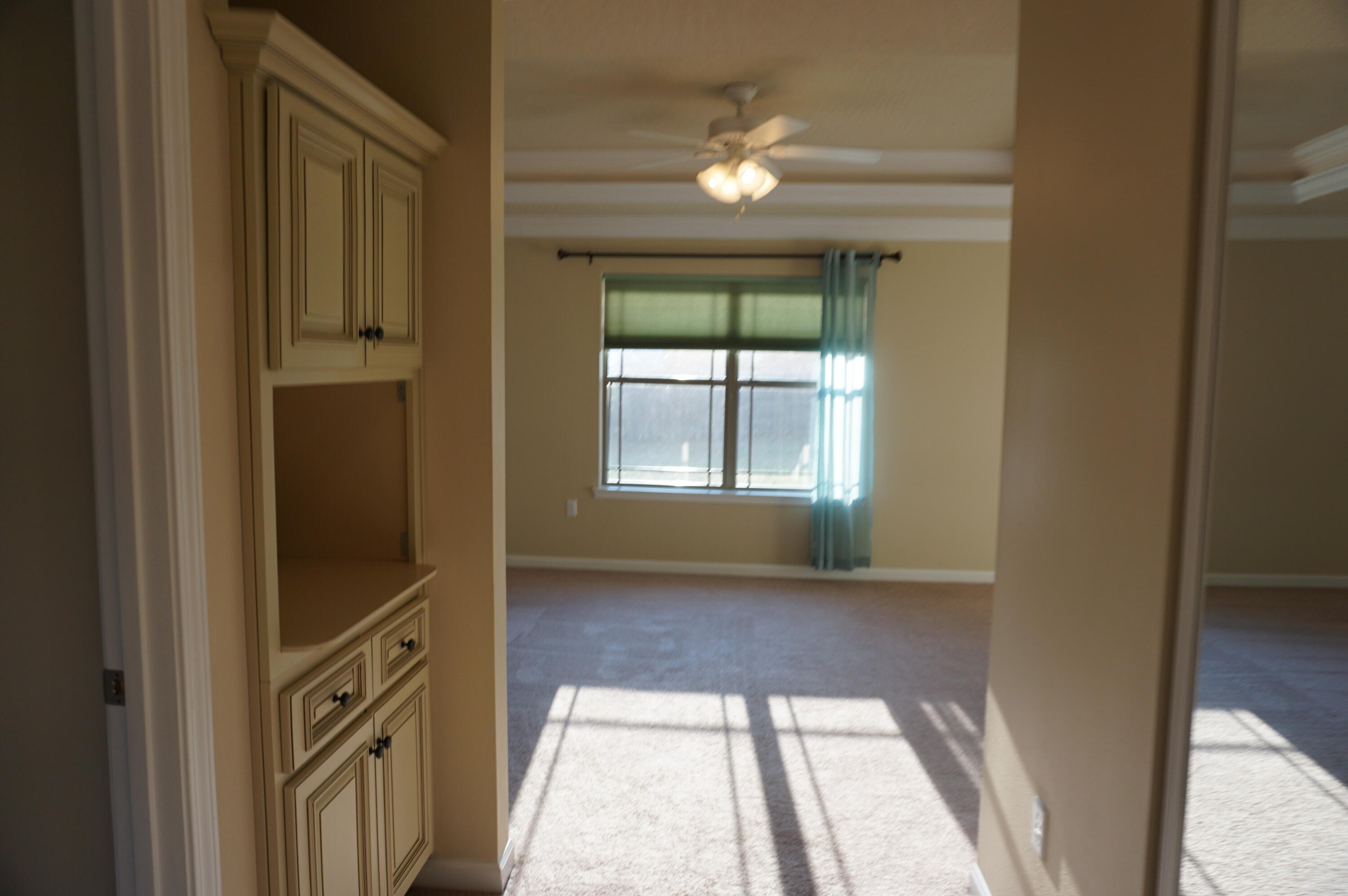5263 Moore Loop Crestview, FL 32536 - Photo 23 of 37 a view of a hallway