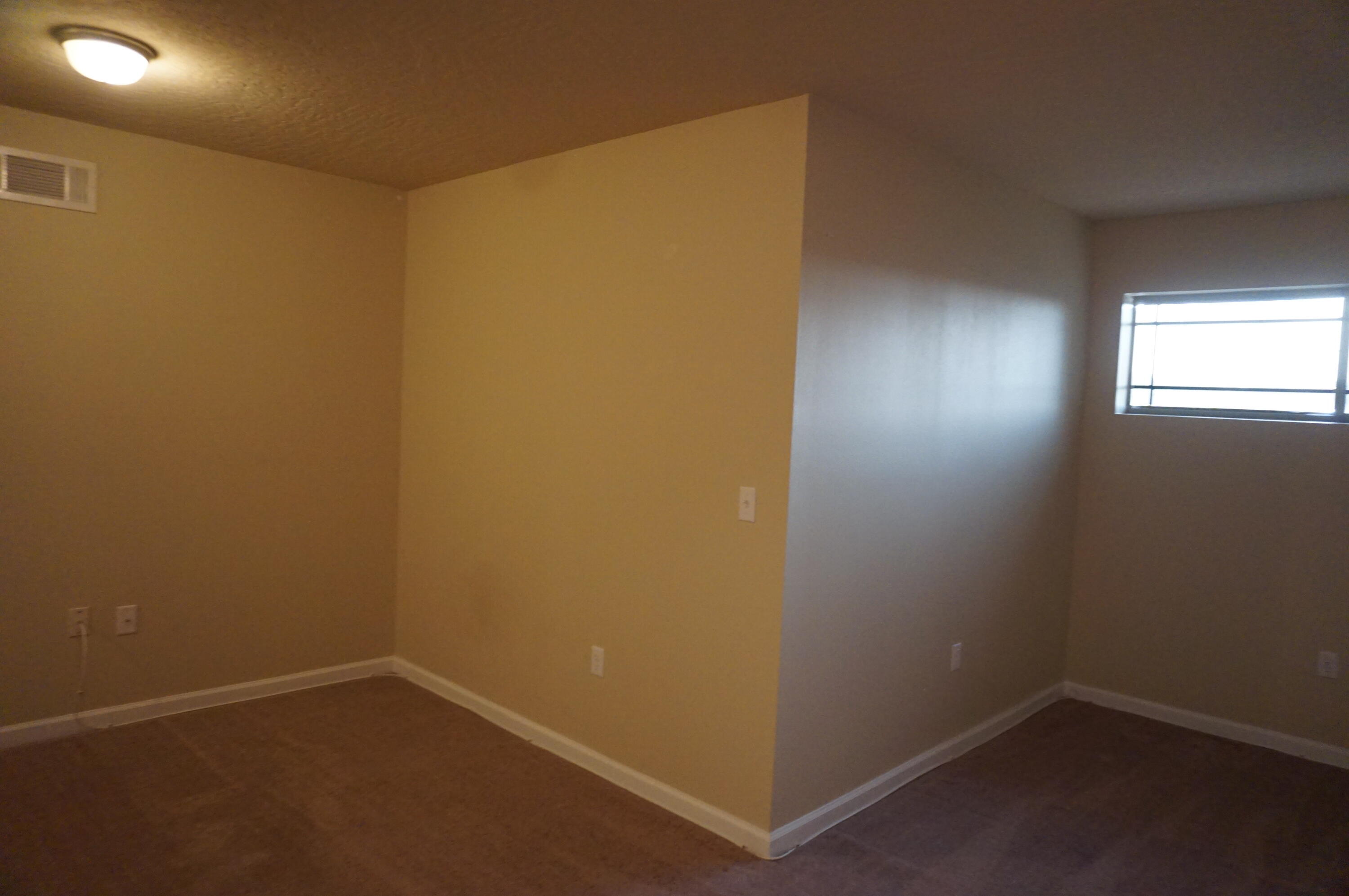5263 Moore Loop Crestview, FL 32536 - Photo 31 of 37 an empty room with a empty space and a window
