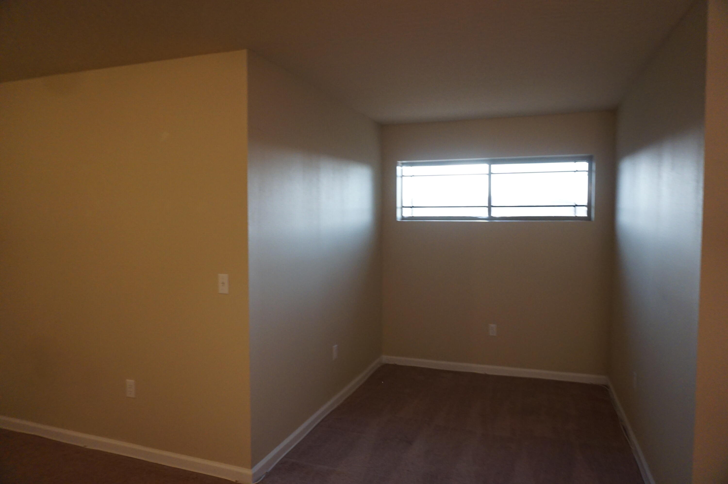 5263 Moore Loop Crestview, FL 32536 - Photo 32 of 37 an empty room with a window