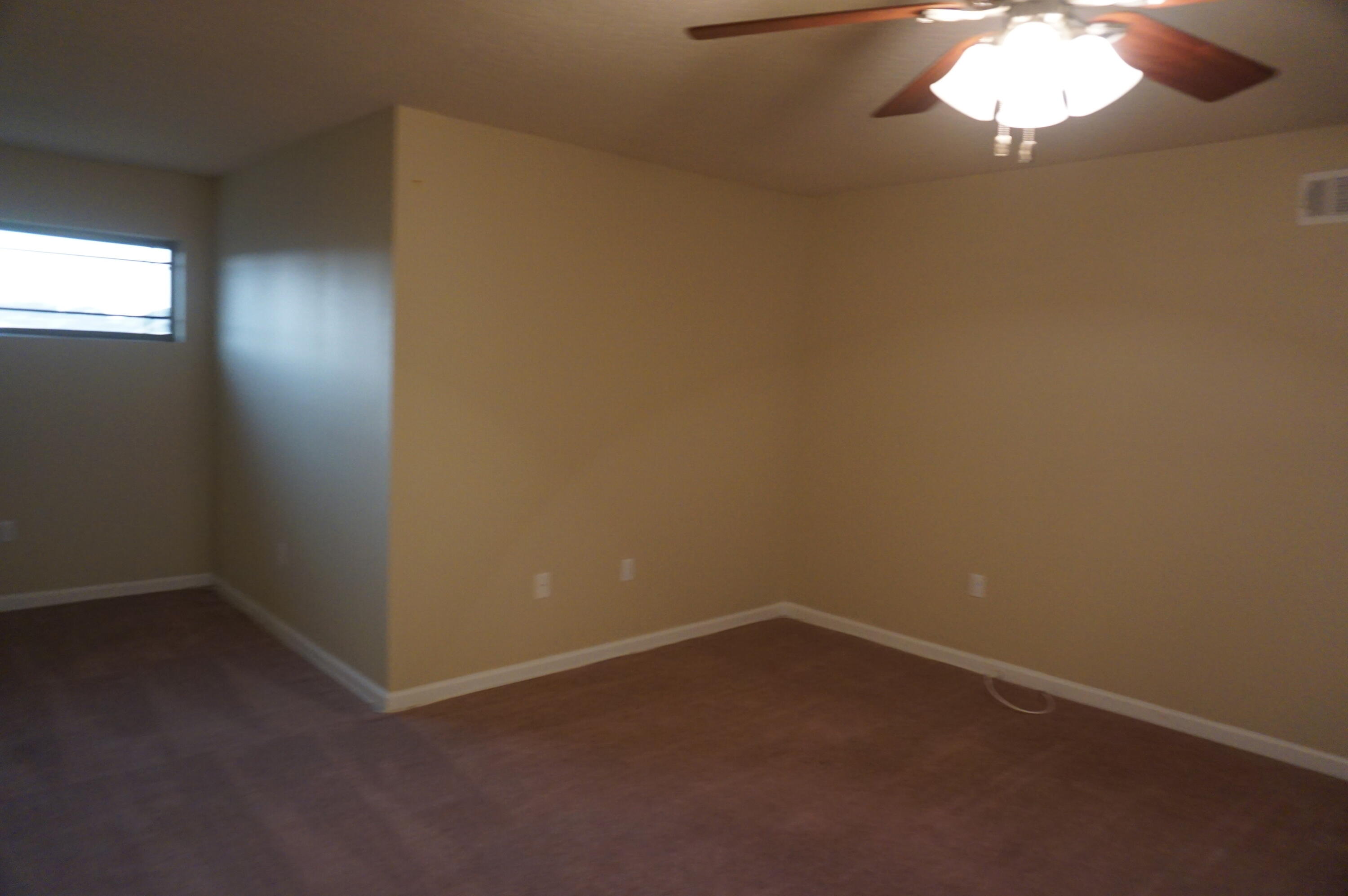 5263 Moore Loop Crestview, FL 32536 - Photo 34 of 37 an empty room with a window