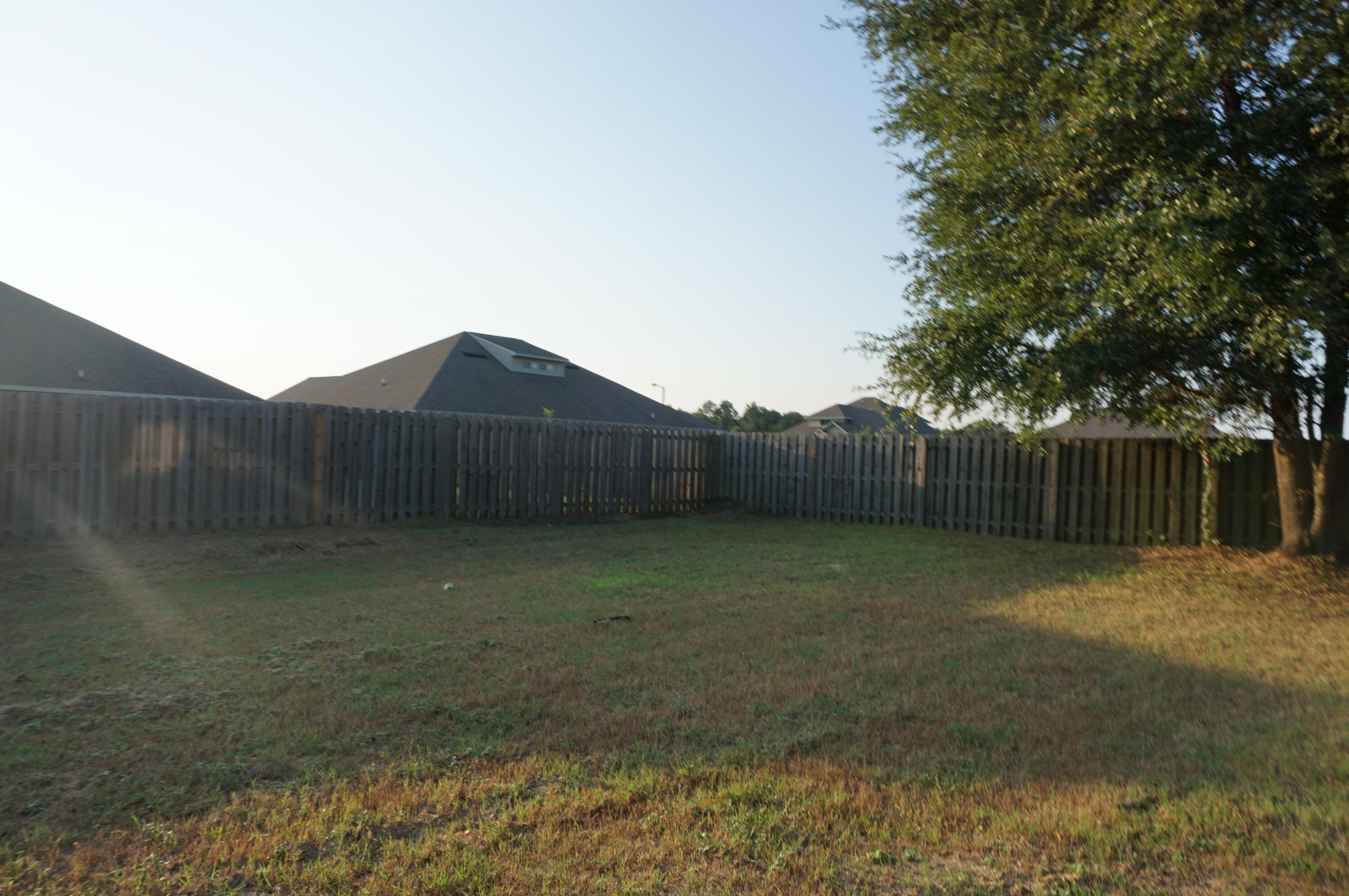 5263 Moore Loop Crestview, FL 32536 - Photo 35 of 37 a backyard of a house