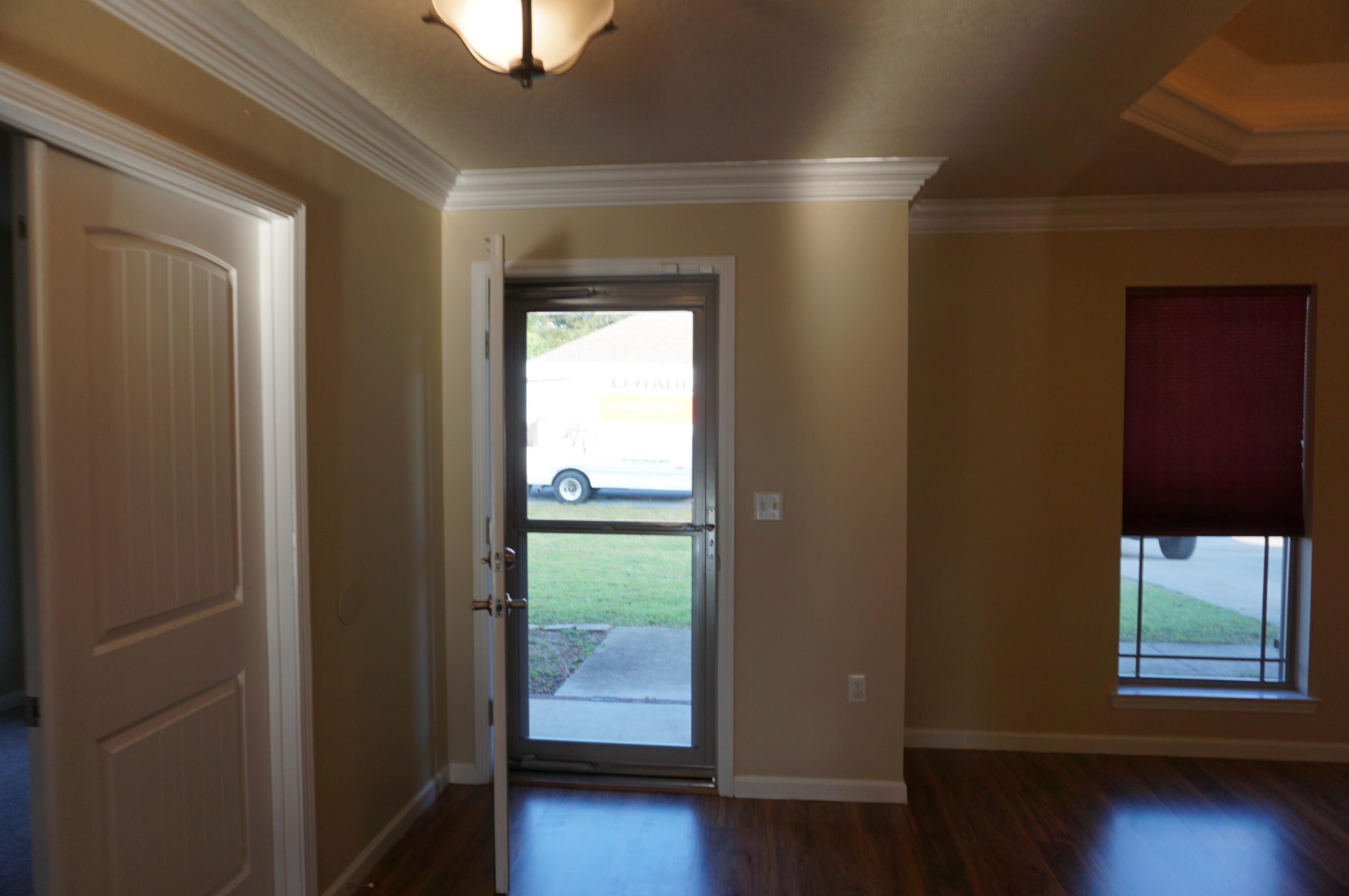 5263 Moore Loop Crestview, FL 32536 - Photo 4 of 37 a view of room with window and wooden floor