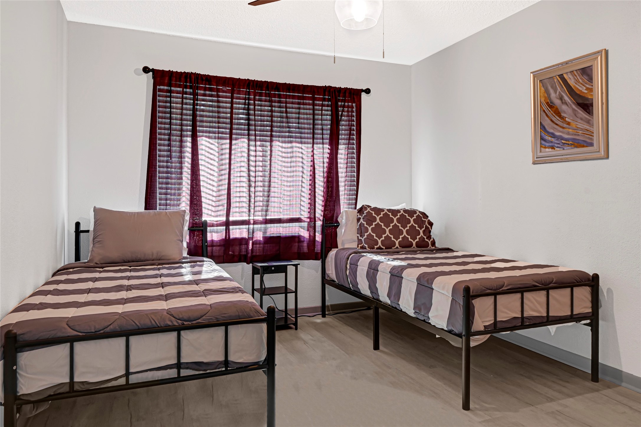 1806 Clayton Drive Baytown, TX 77520 - Photo 12 of 40 a bedroom with a bed and window