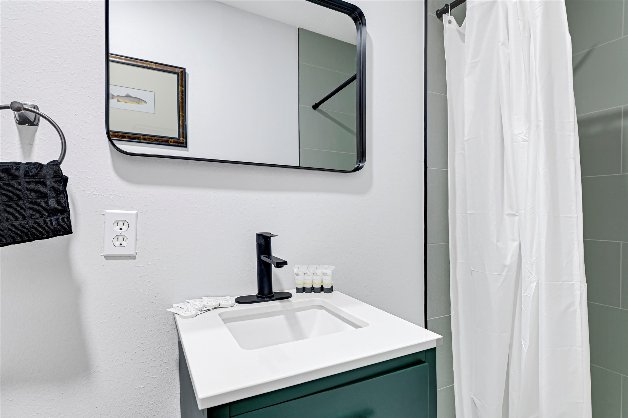 1806 Clayton Drive Baytown, TX 77520 - Photo 15 of 40 a bathroom with a sink and a mirror