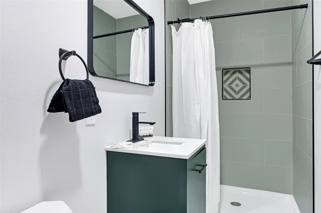 a living room with a couch and a couch