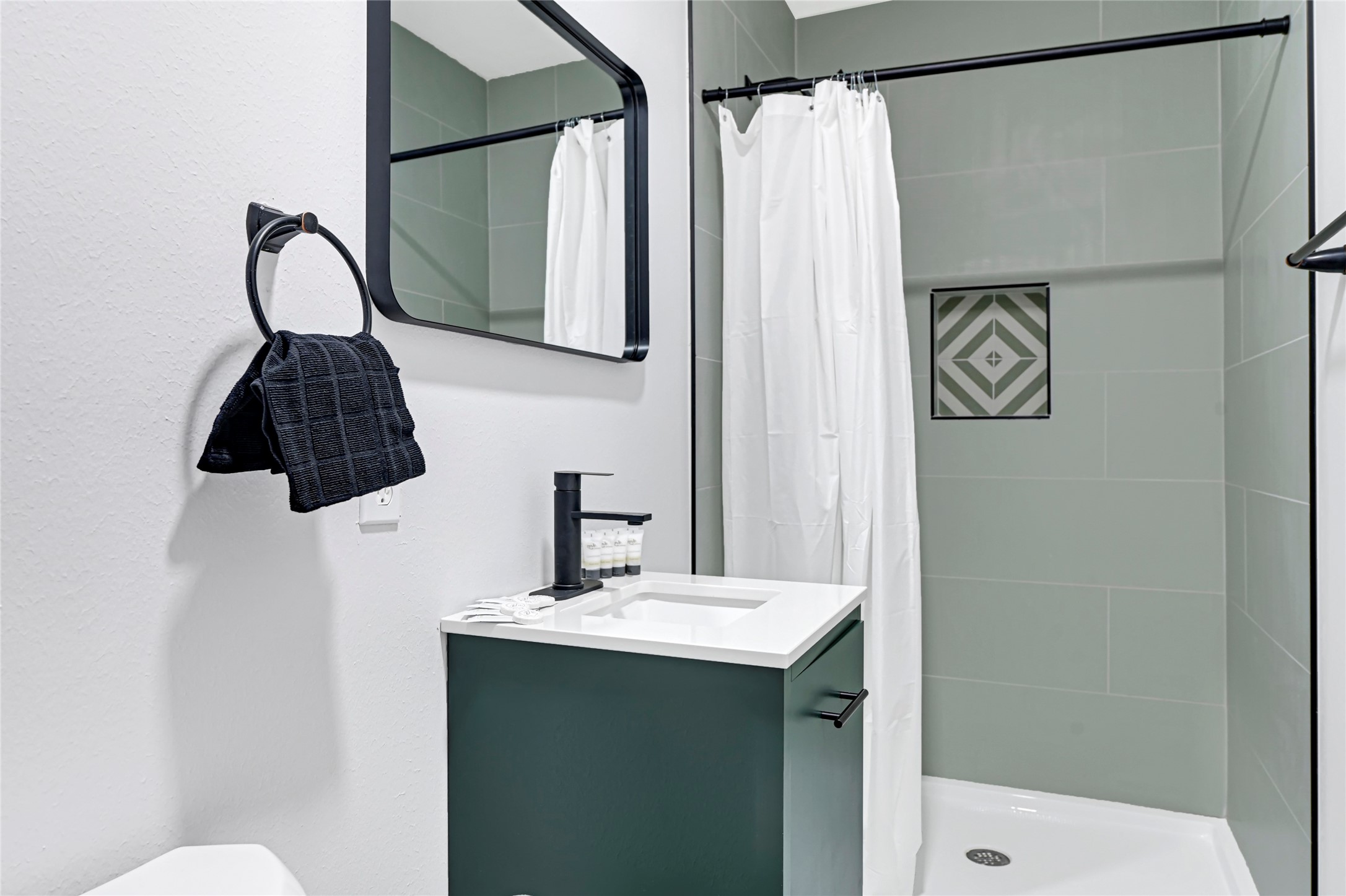 1806 Clayton Drive Baytown, TX 77520 - Photo 18 of 40 a bathroom with a sink and mirror