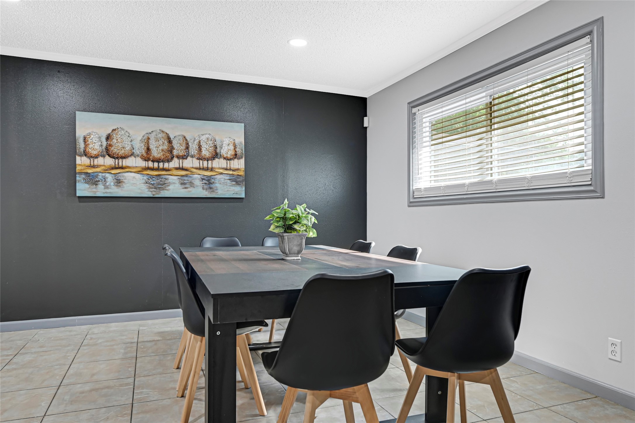 1806 Clayton Drive Baytown, TX 77520 - Photo 22 of 40 a view of a dining room with furniture window and wooden floor