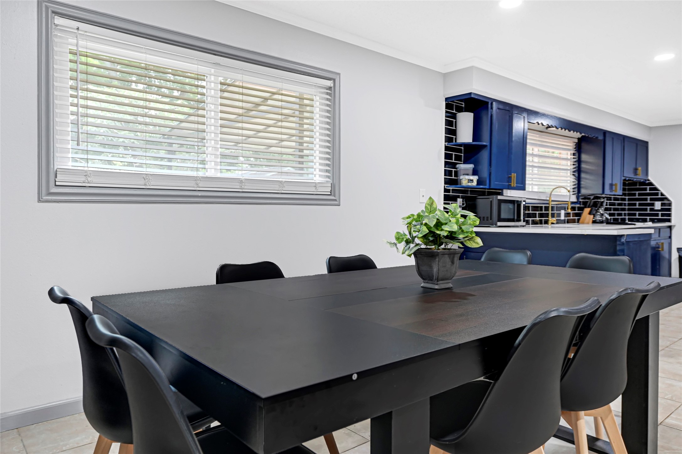 1806 Clayton Drive Baytown, TX 77520 - Photo 34 of 40 a view of a dining room with furniture and wooden floor
