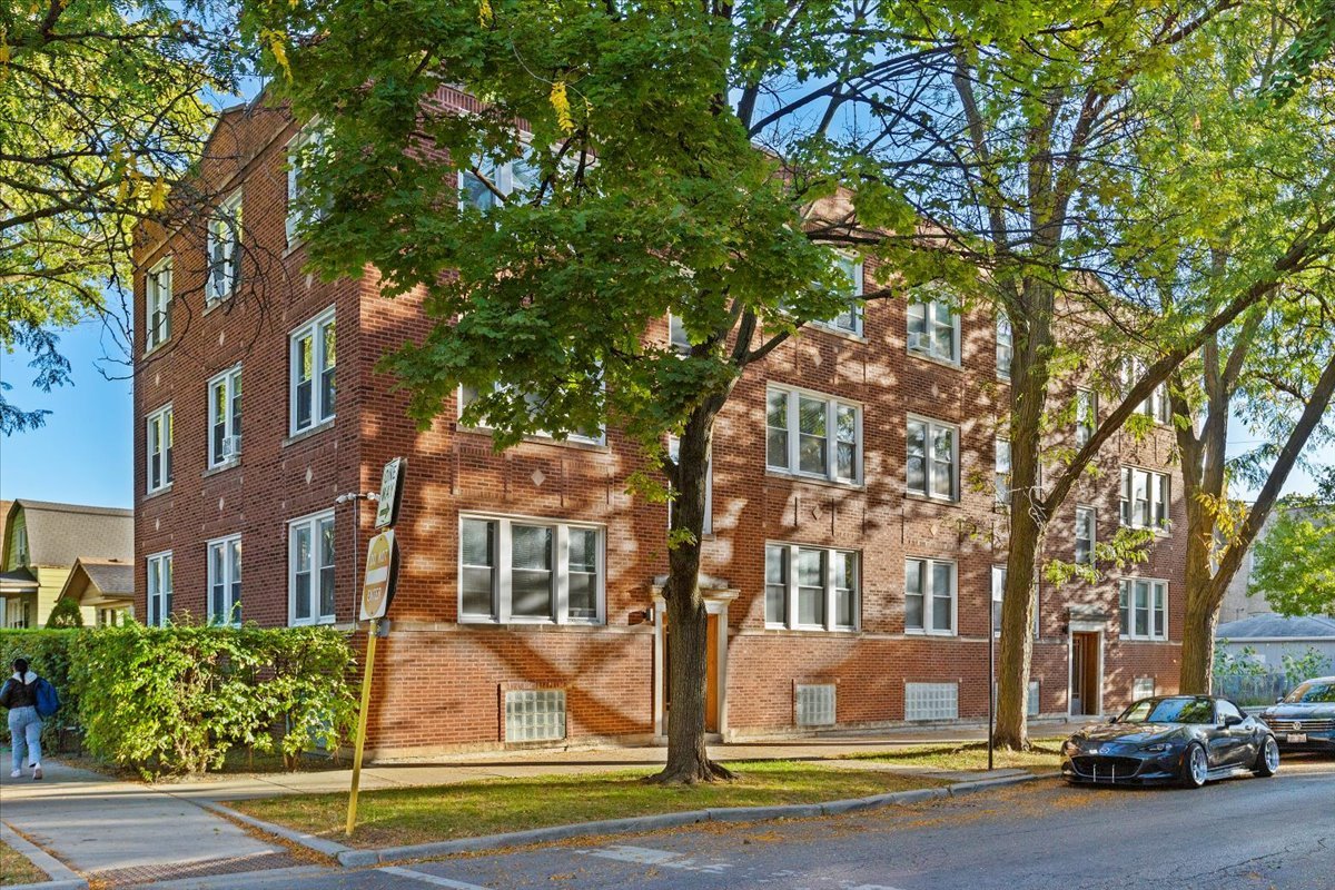 a front view of a building with street view