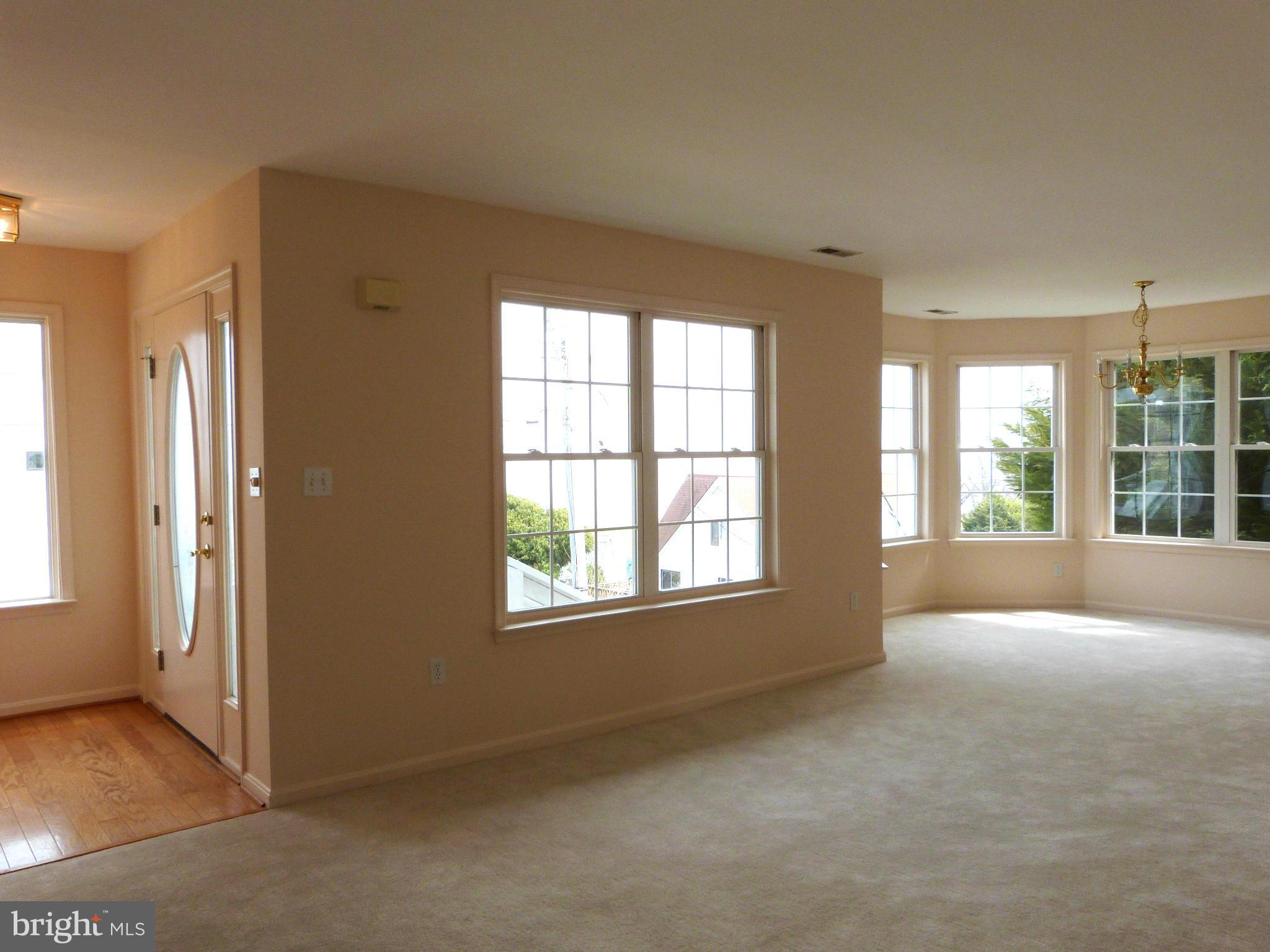 2800 Ridge Road Huntingtown, MD 20639 - Photo 4 of 17 an empty room with windows
