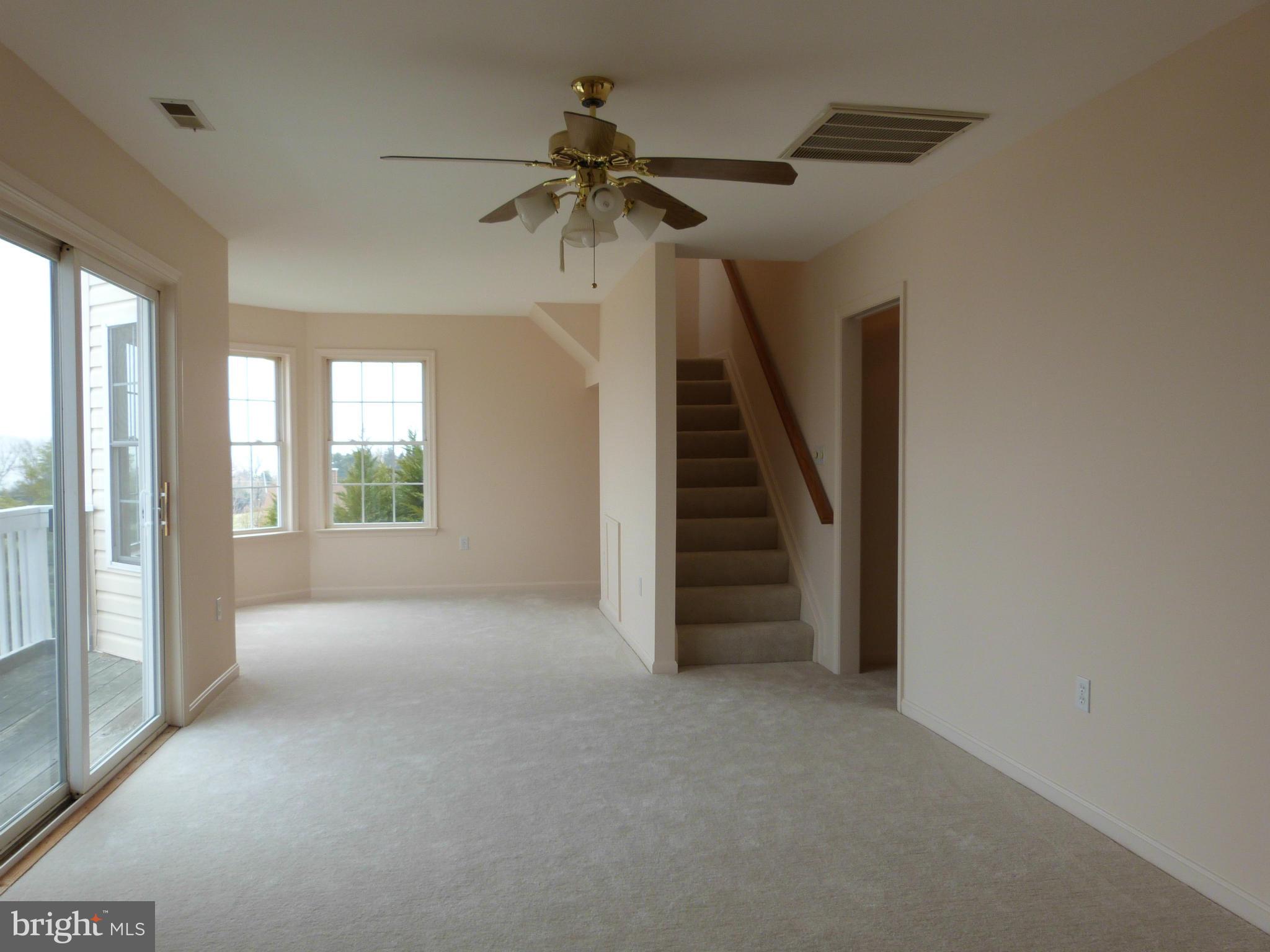 2800 Ridge Road Huntingtown, MD 20639 - Photo 9 of 17 a view of a big room with windows and entryway
