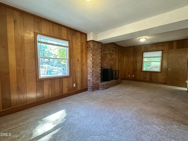 a utility room with sink dryer and washer