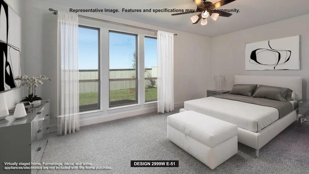 521 Cooper Street Celina, TX 75009 - Photo 2 of 3 a bedroom with a large bed and a chandelier fan