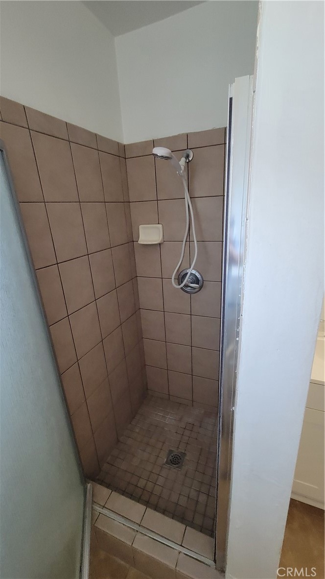 7004 Amethyst Avenue, Unit 3 Rancho Cucamonga, CA 91701 - Photo 5 of 7 a bathroom with a shower