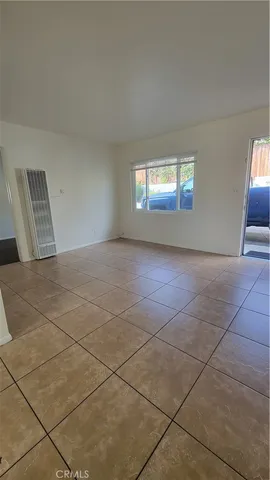 a kitchen with a cabinets and window