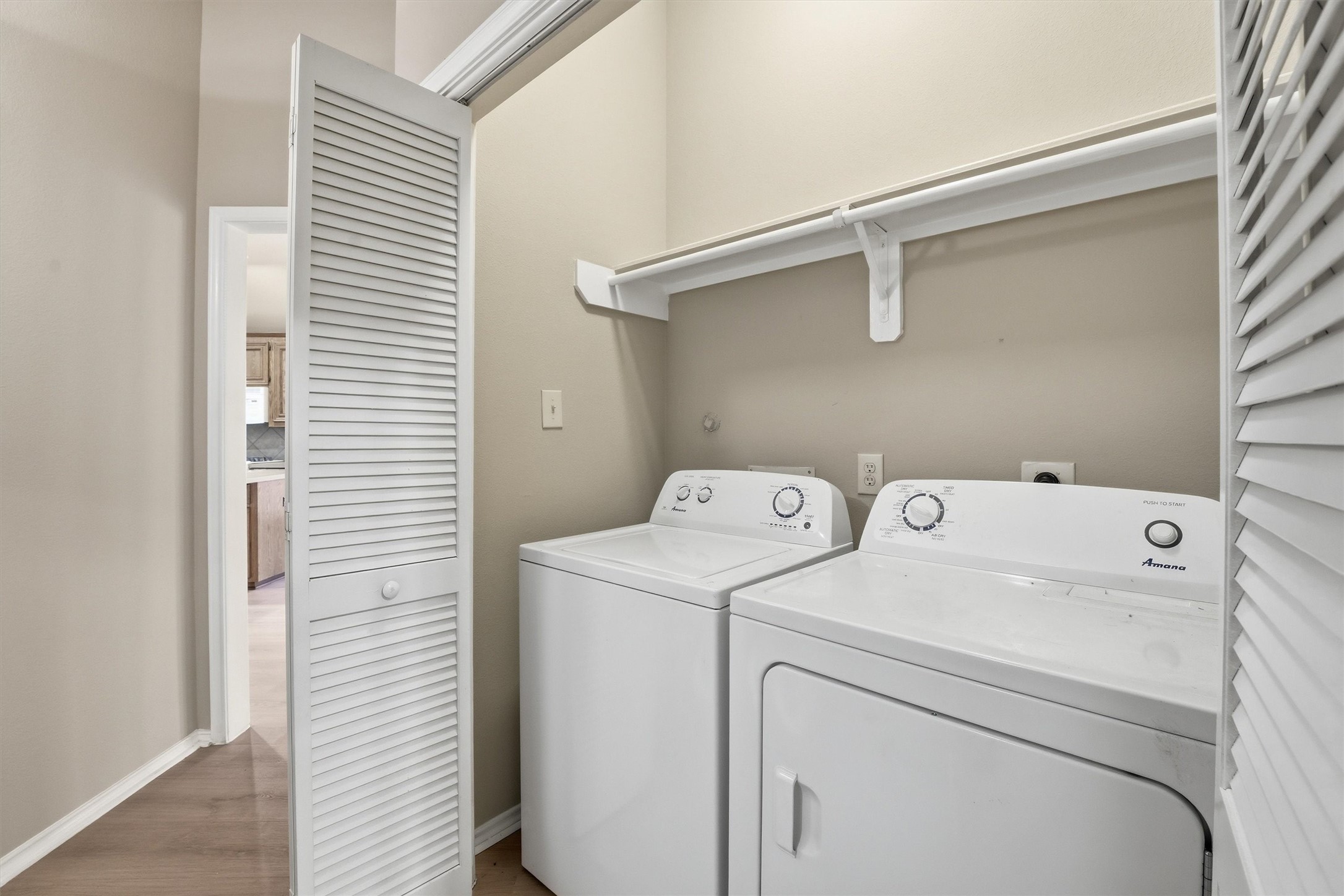 20931 Hamlet Ridge Lane Katy, TX 77449 - Photo 22 of 23 Laundry area conveniently located in the hallway near secondary bedrooms; washer and dryer included.