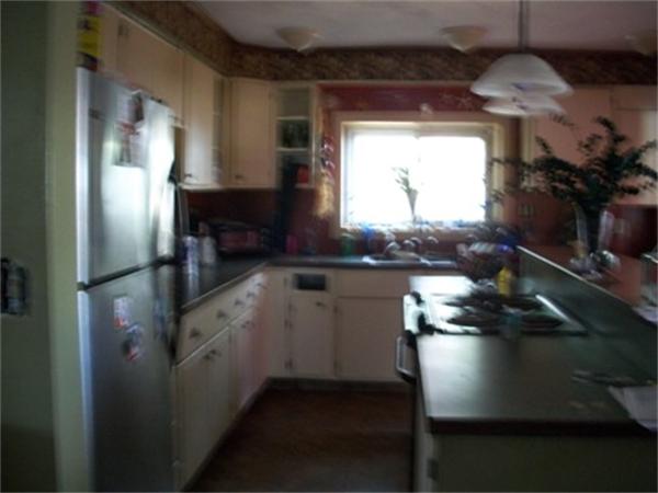68 Lawndale Street Springfield, MA 01108 - Photo 7 of 7 a kitchen with counter top space and appliances
