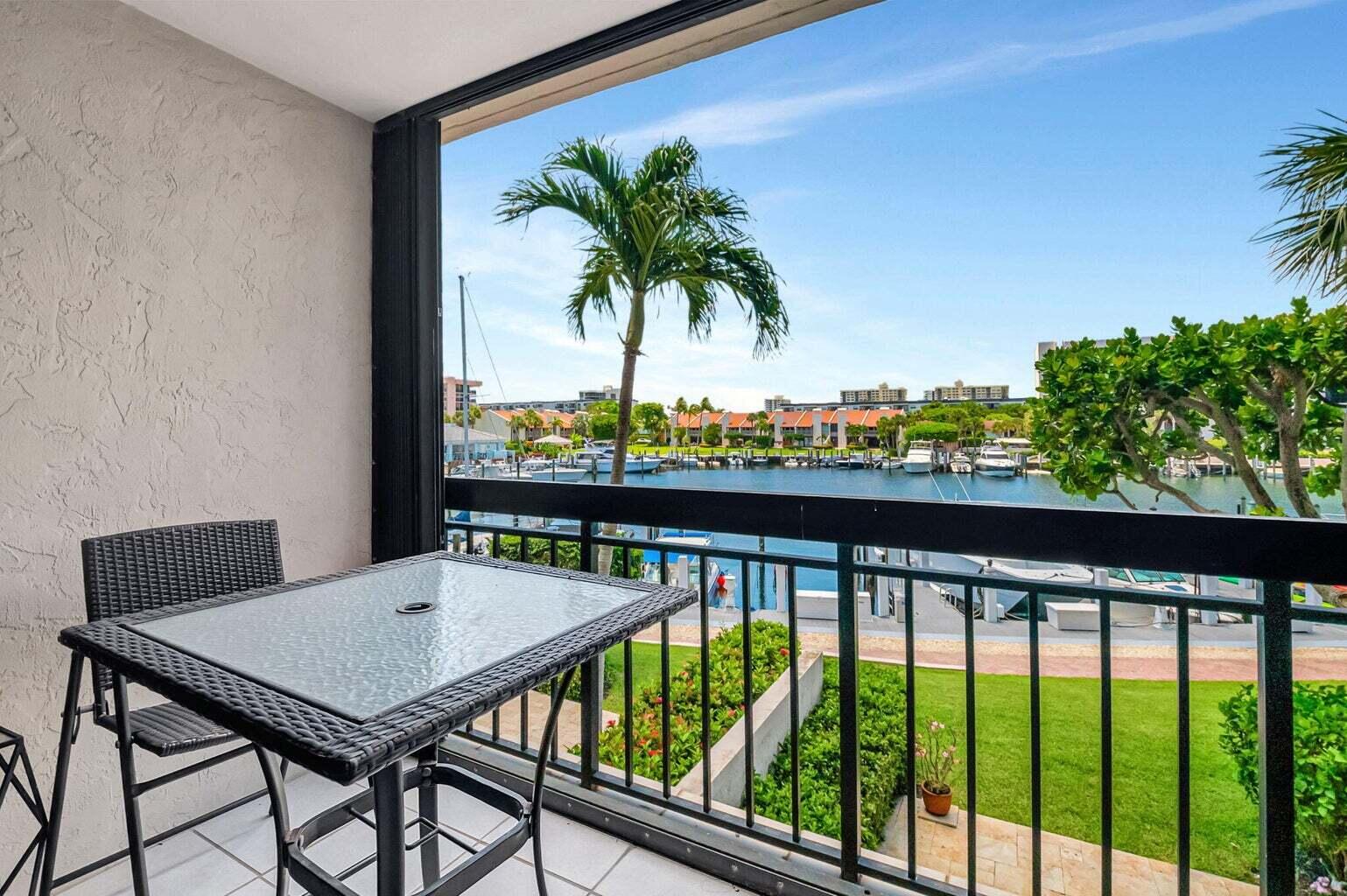 2707 North Ocean Boulevard, Unit D205 Boca Raton, FL 33431 - Photo 12 of 51 a view of a balcony with furniture