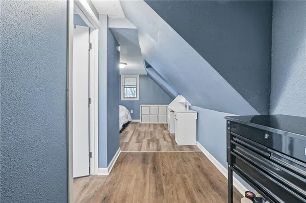 a view of balcony with wooden floor