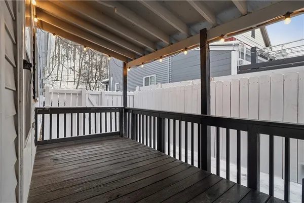 a view of a house with a snow in the yard