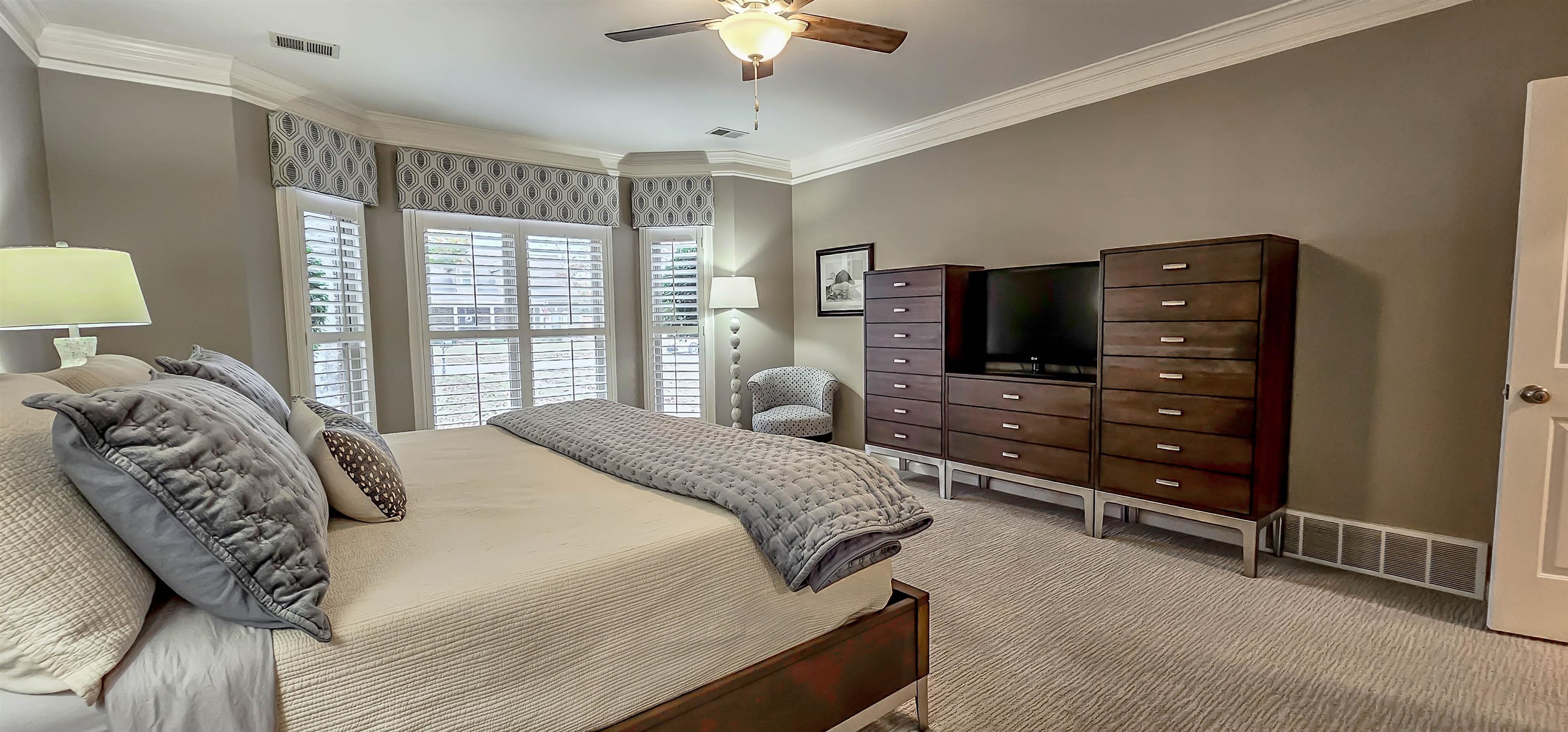 1715 John Ridge Drive Collierville, TN 38017 - Photo 19 of 37 Huge Primary Suite Downstairs with wonderful Large Windows and Luxury upgraded Berber Carpet!