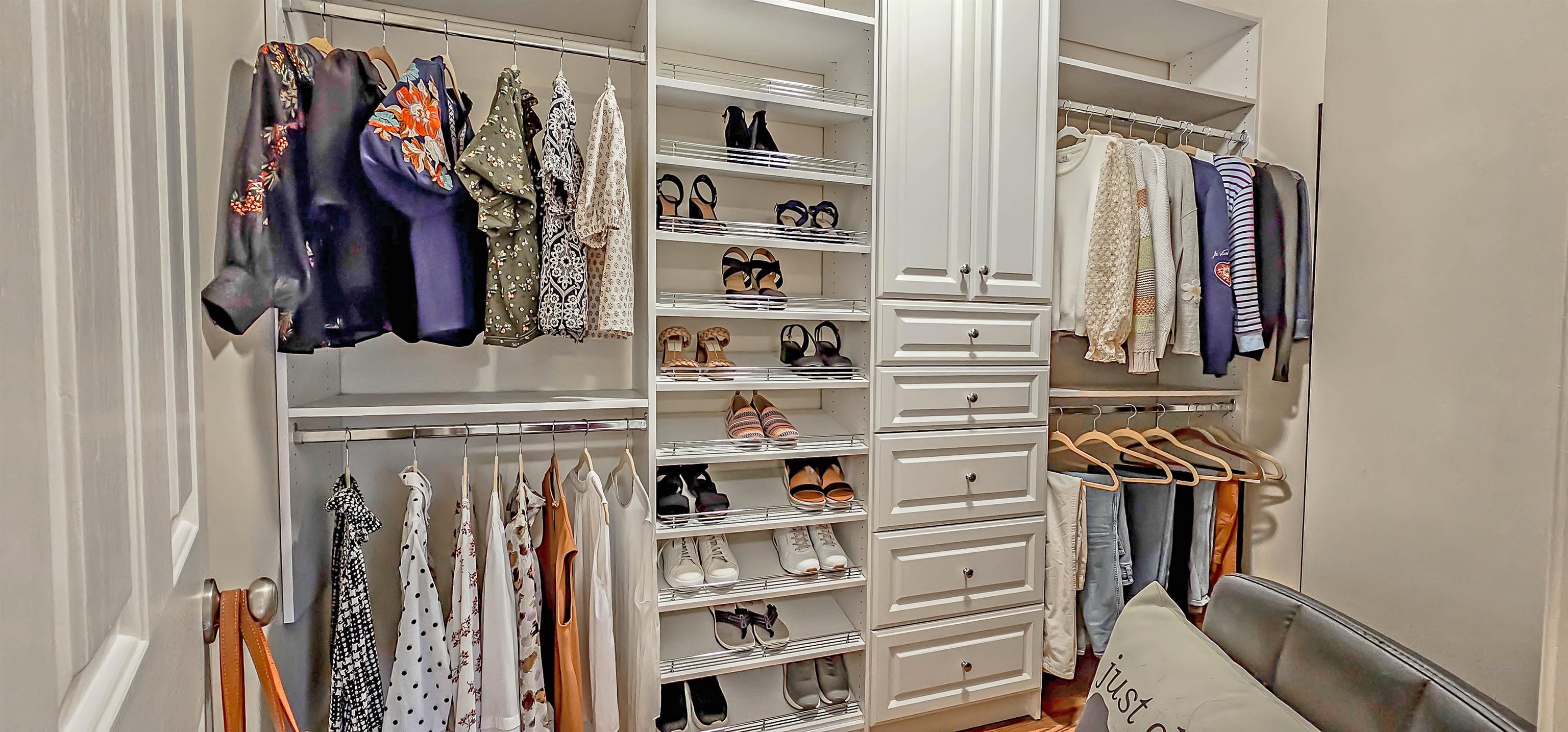1715 John Ridge Drive Collierville, TN 38017 - Photo 22 of 37 Spacious Walk-in Closet with Custom Shelves, Shoe Rack and Cabinets! There is a His & Hers!