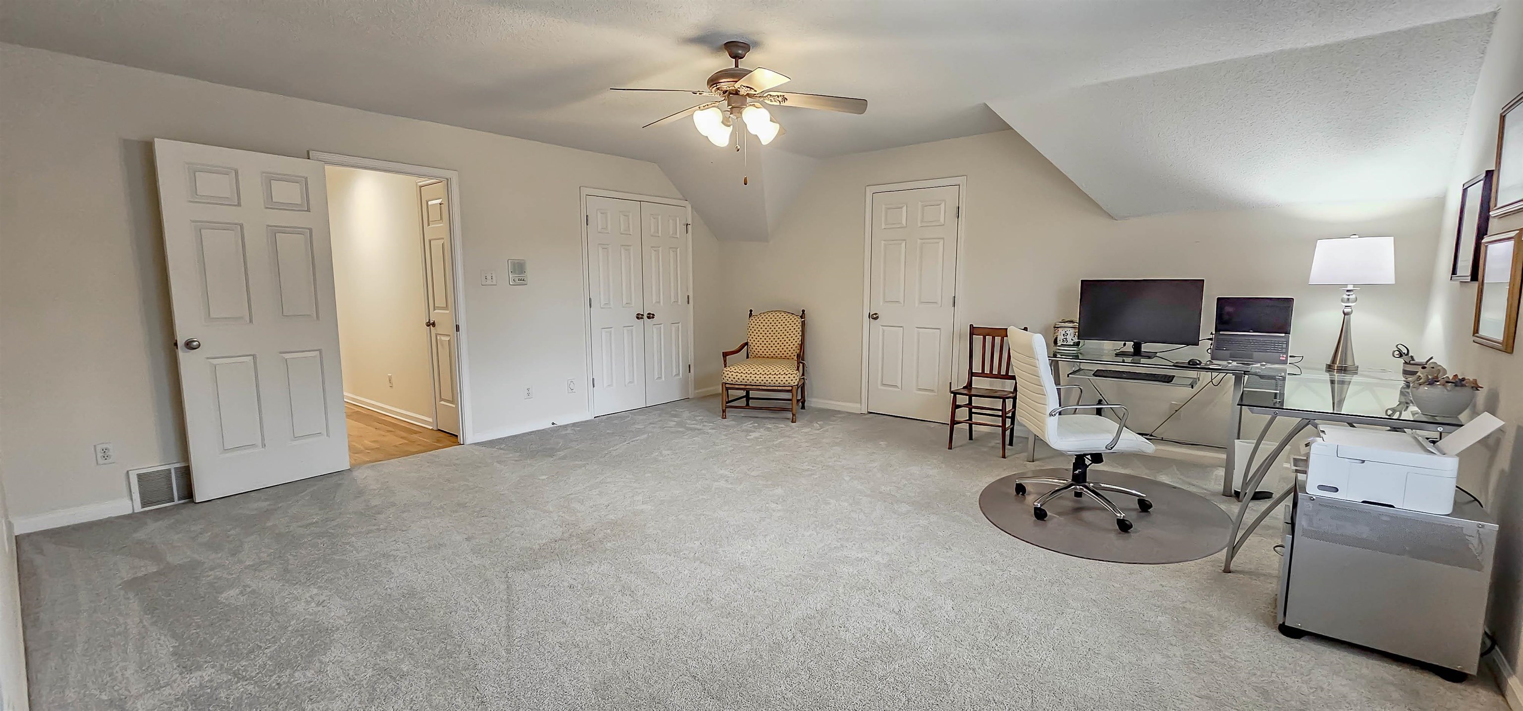 1715 John Ridge Drive Collierville, TN 38017 - Photo 32 of 37 Big Bonus Room Upstairs with Attic Storage! Could be used as Nice Workout Room with Equipment!
