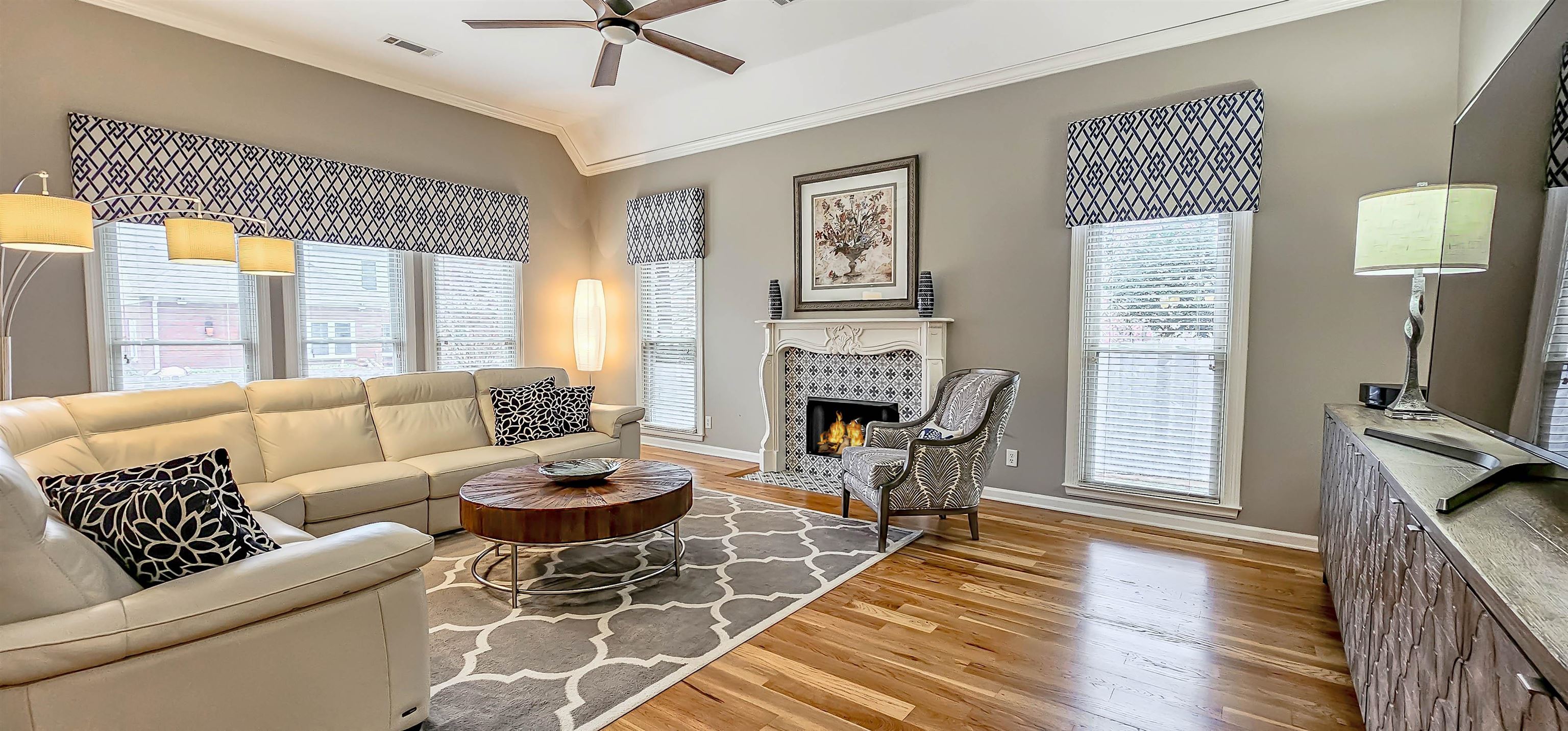 1715 John Ridge Drive Collierville, TN 38017 - Photo 7 of 37 Family-Sized Great Room w/Fireplace with custom white mantel and Beautiful hardwood floor!