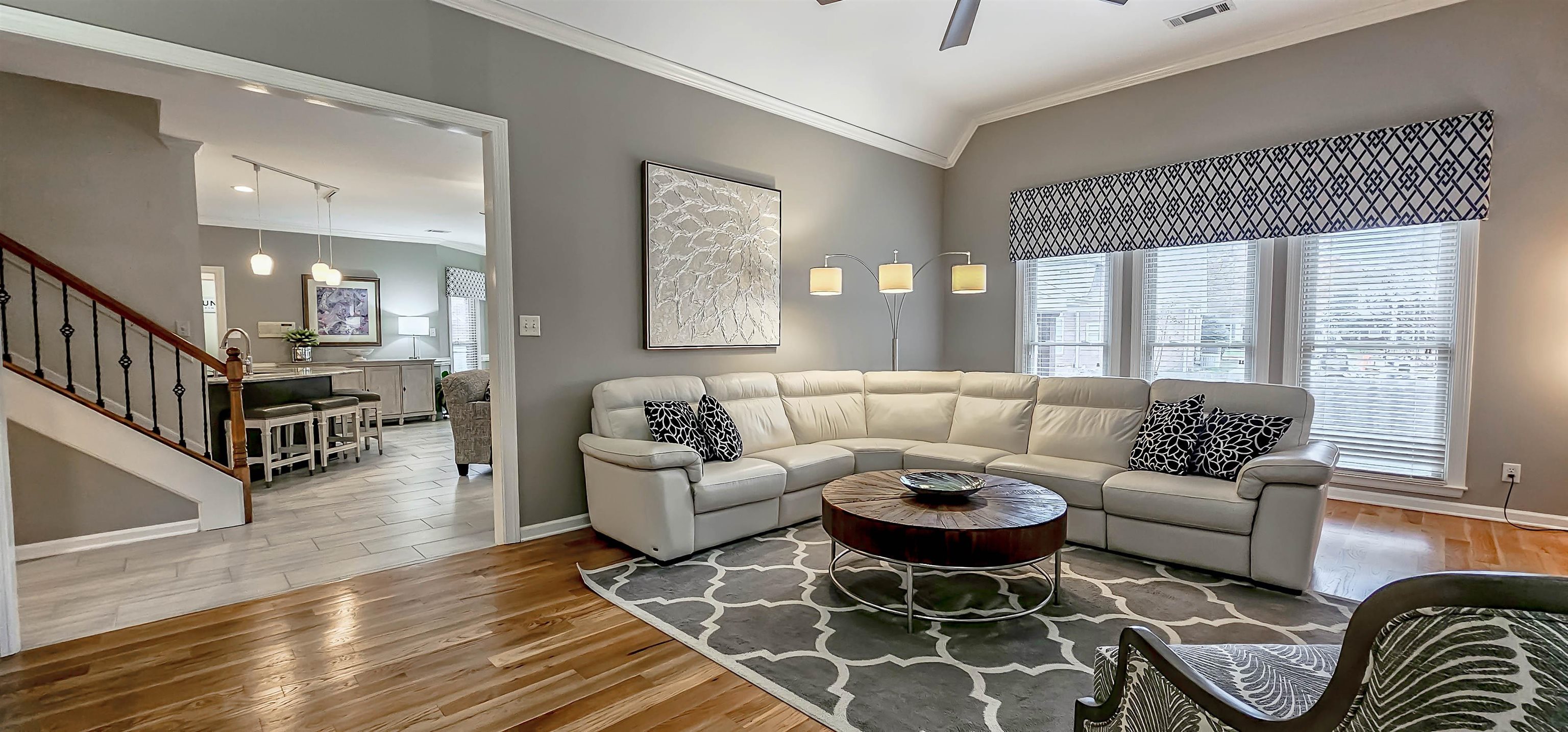 1715 John Ridge Drive Collierville, TN 38017 - Photo 8 of 37 Gleaming Hardwood Floors and High Coffered Smooth Ceiling with fan!