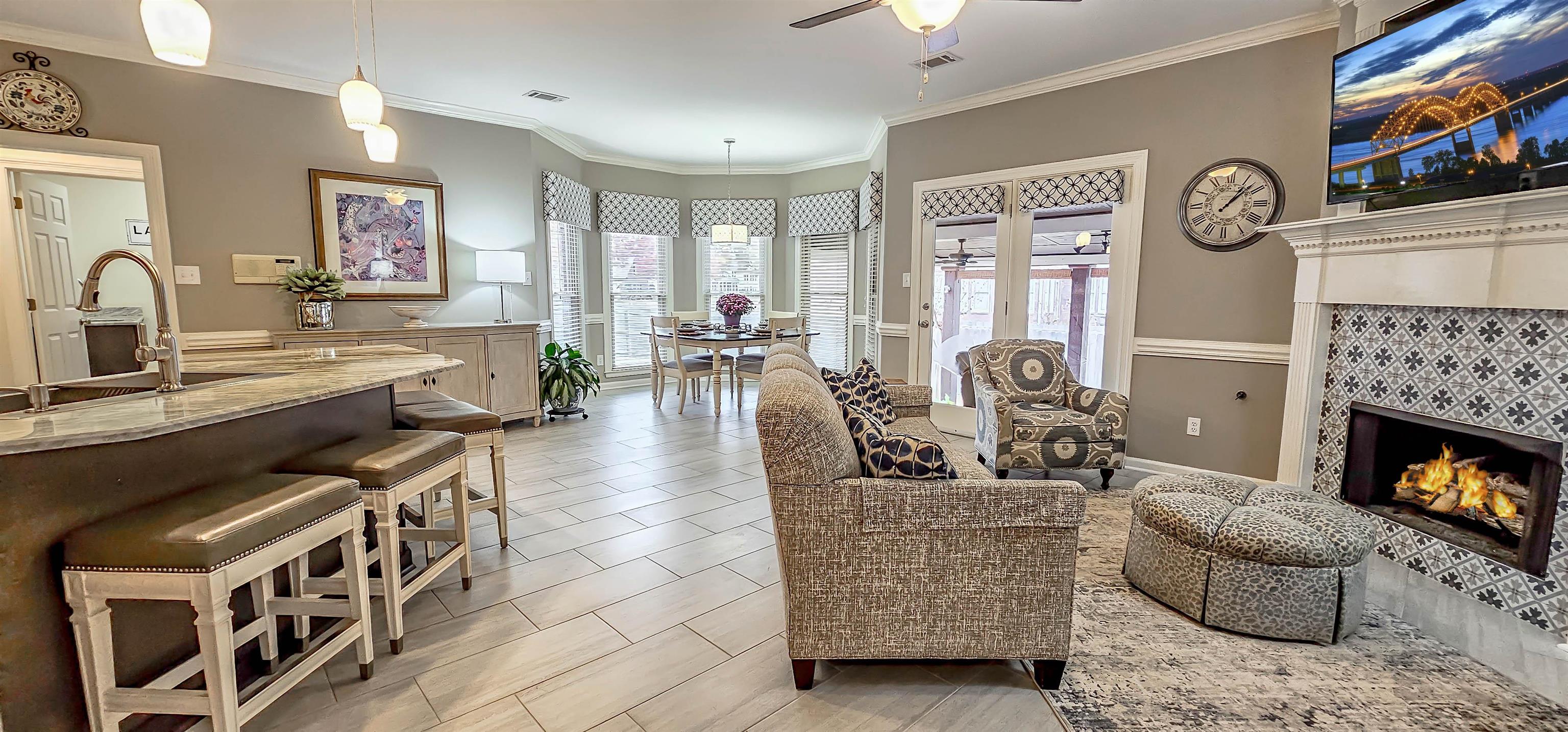 1715 John Ridge Drive Collierville, TN 38017 - Photo 10 of 37 Big Breakfast Bar with Pendant Lighting is Great to visit with family & friends while preparing the days meals!