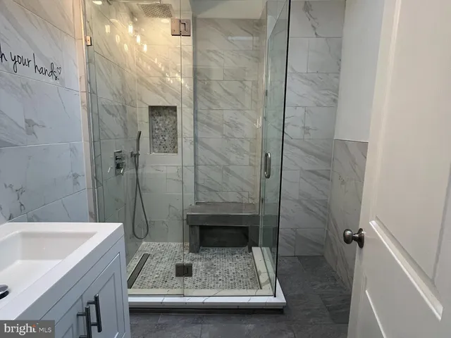 a bathroom with a sink and a bathtub
