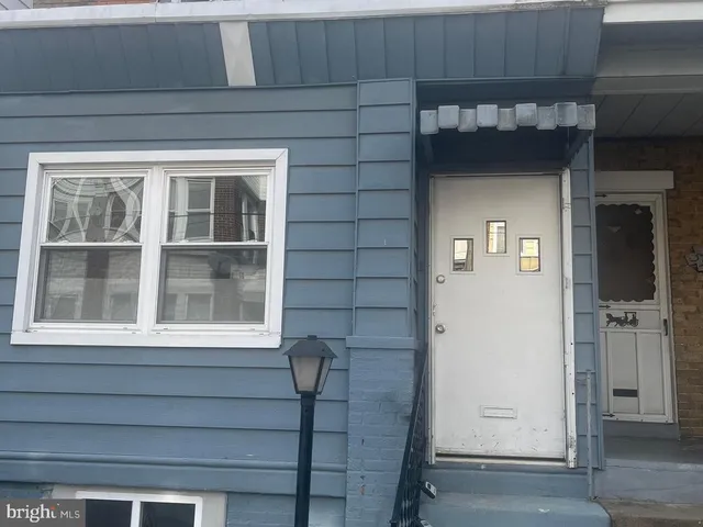 a front view of a house with a window