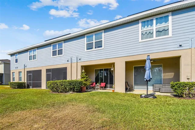 a view of walk in closet with clothes