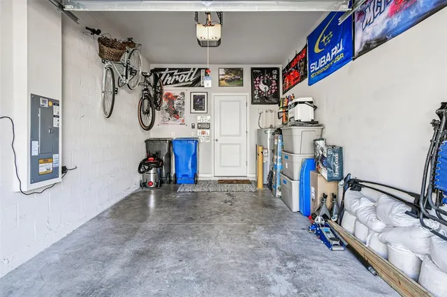 a view of a hallway with wooden floor and entryway