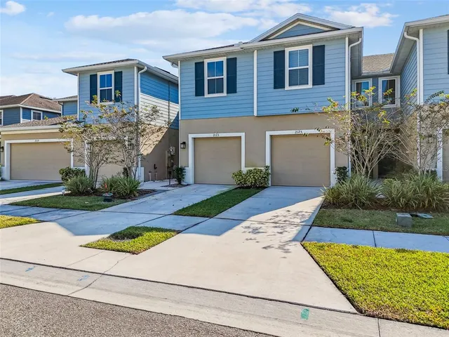 a view of a city with an ocean beach
