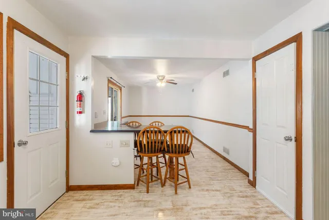 a view of entryway with wooden floor