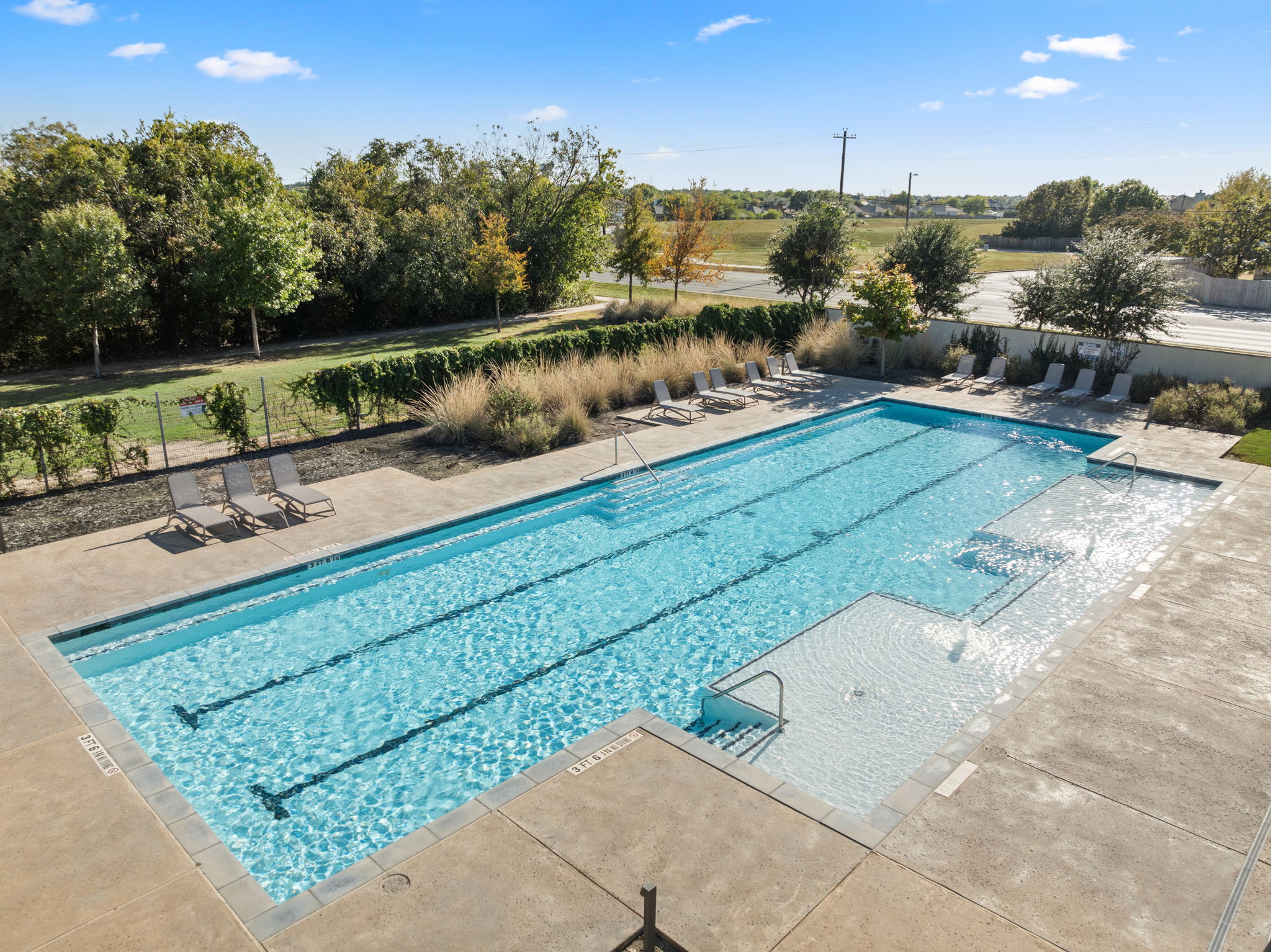 740 Aliso Trail Leander, TX 78641 - Photo 32 of 35 Residents enjoy a refreshing community pool located just a short walk from the home.