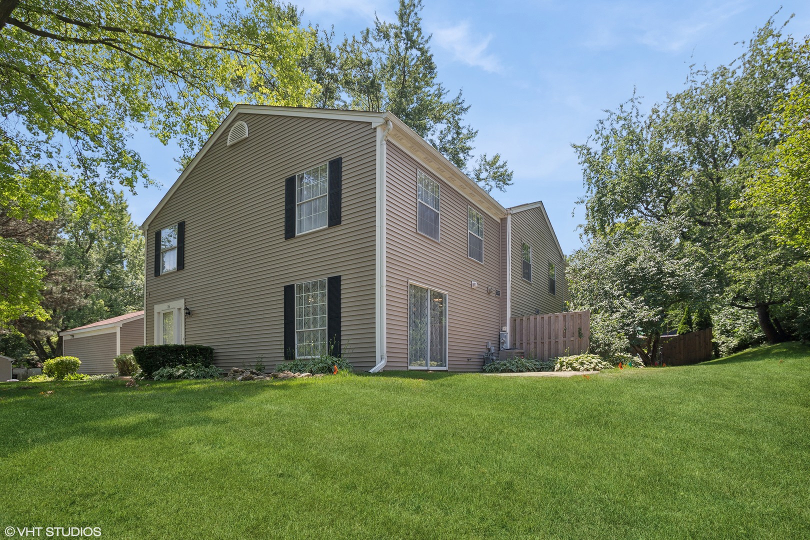 16 Forest Lane Cary, IL 60013 - Photo 14 of 18 a house that is sitting in the grass