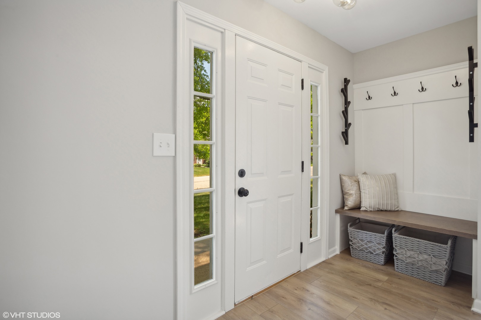 16 Forest Lane Cary, IL 60013 - Photo 2 of 18 a view of a livingroom with wooden floor and white walls