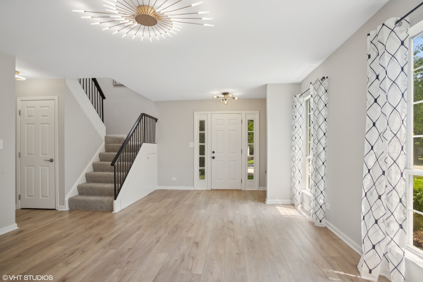 16 Forest Lane Cary, IL 60013 - Photo 4 of 18 a view of an entryway with wooden floor