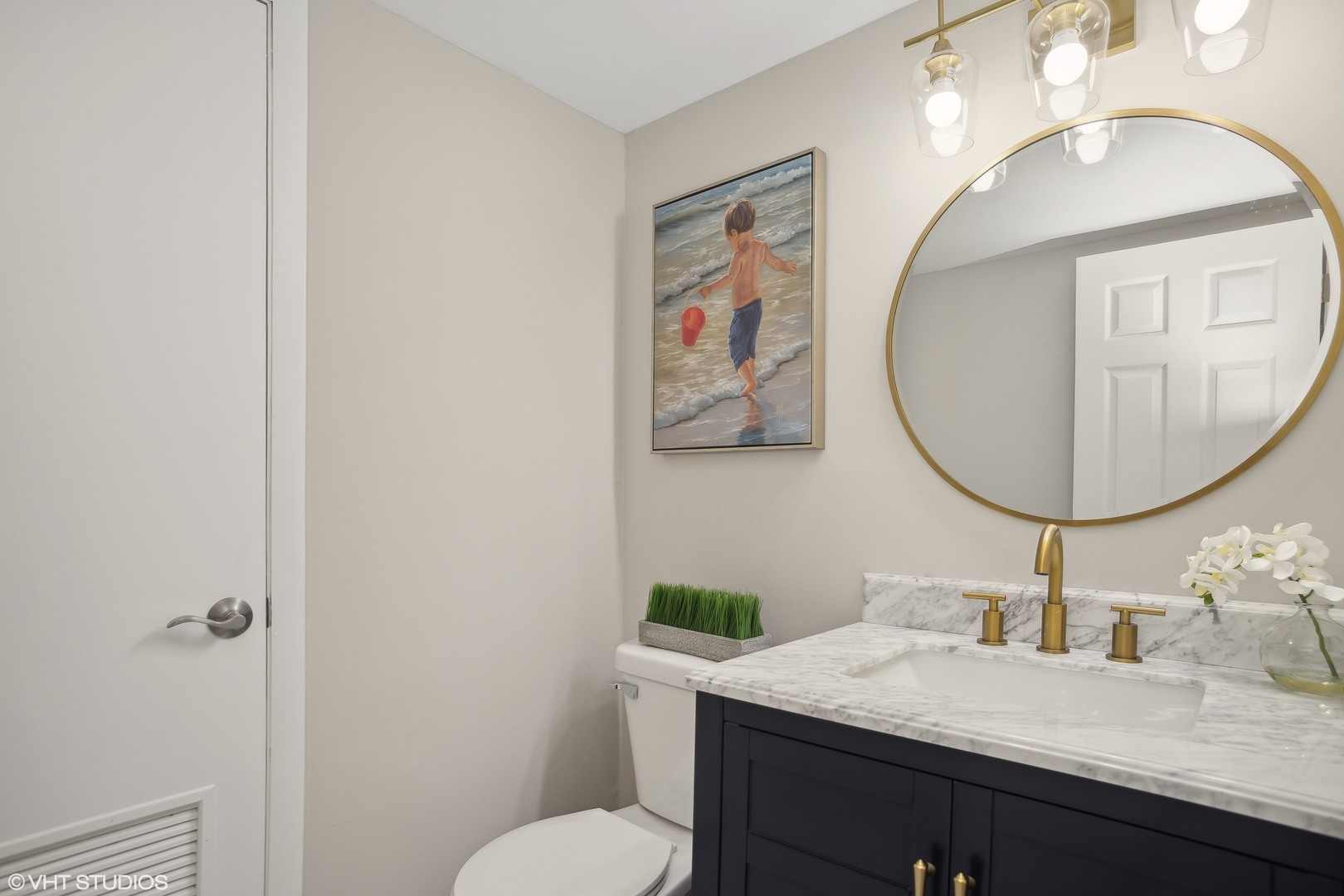 16 Forest Lane Cary, IL 60013 - Photo 8 of 18 a bathroom with a granite countertop sink mirror vanity and toilet