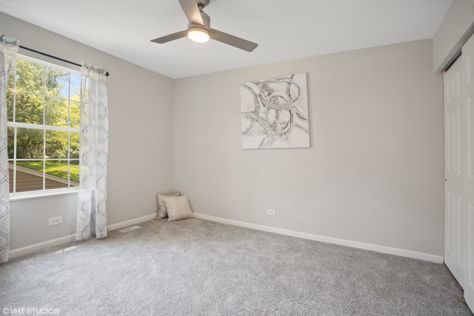 16 Forest Lane Cary, IL 60013 - Photo 9 of 18 wooden floor in an empty room with a window