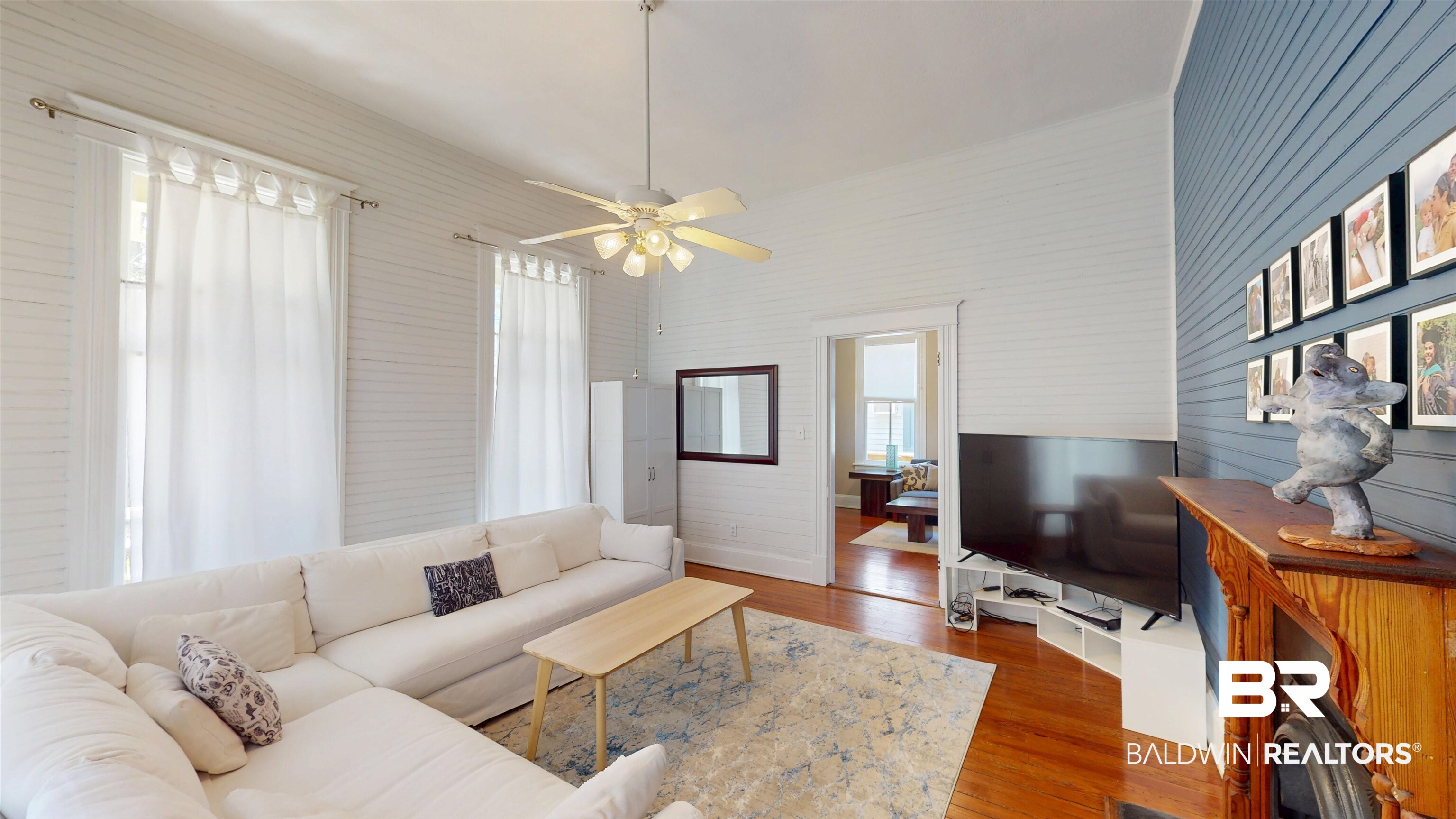 1154 New St Francis Street Mobile, AL 36604 - Photo 11 of 37 Living room featuring wood finished floors and ceiling fan