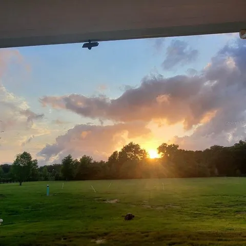 a view of an ocean and mountain